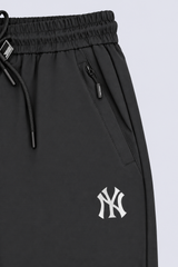 RELAXED FIT ZIPPED JOGGER TROUSERS